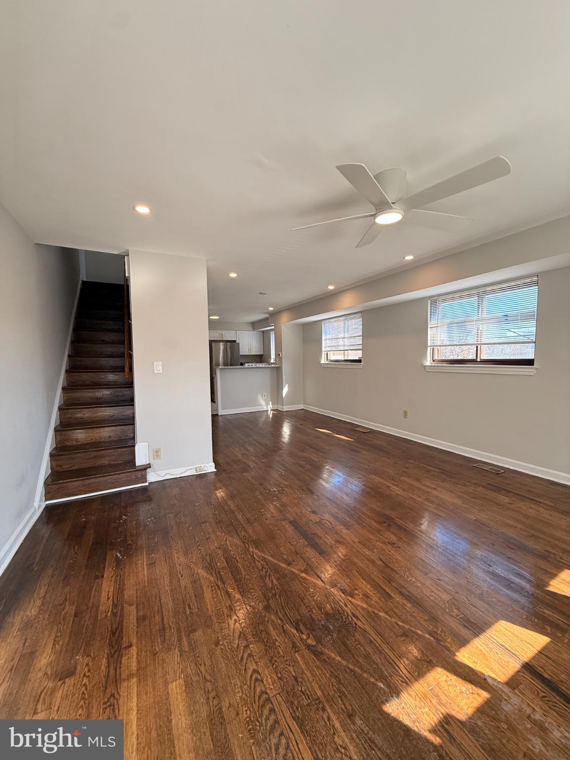 41 Tuckerman Street Northwest Washington, DC 20011 - Photo 3 of 49 a view of an empty room with wooden floor and stairs
