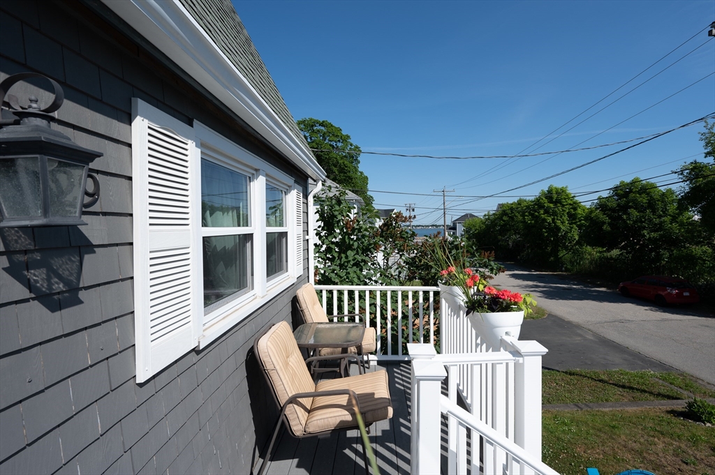 29 Wituwamat Road Weymouth, MA 02191 - Photo 5 of 42 a view of a chairs and tables in the patio