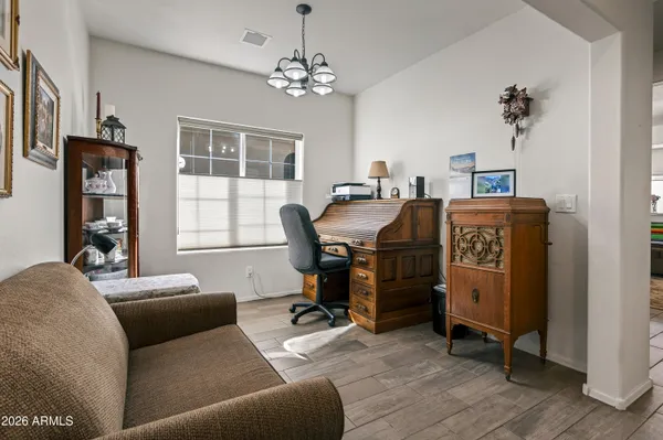 a living room with furniture and a window
