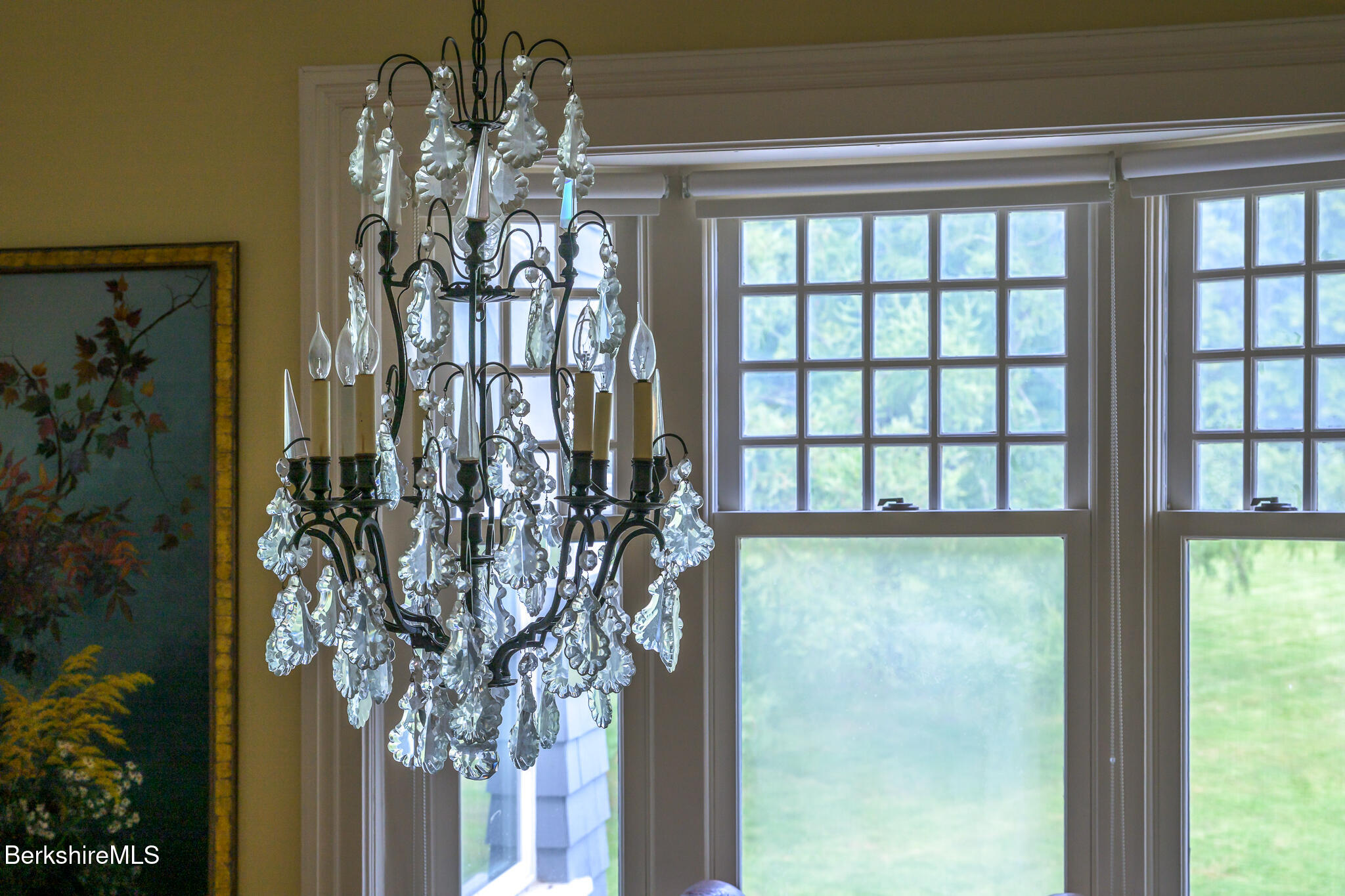 11 Prospect Hill Road, Unit F Stockbridge, MA 01262 - Photo 12 of 51 a vase of flowers sitting on a table next to a window