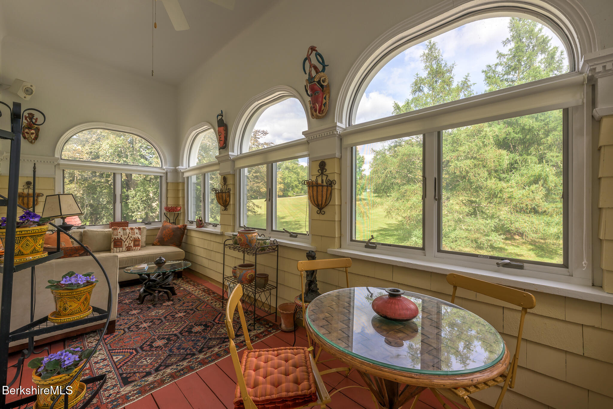 11 Prospect Hill Road, Unit F Stockbridge, MA 01262 - Photo 16 of 51 a living room with furniture and a large window