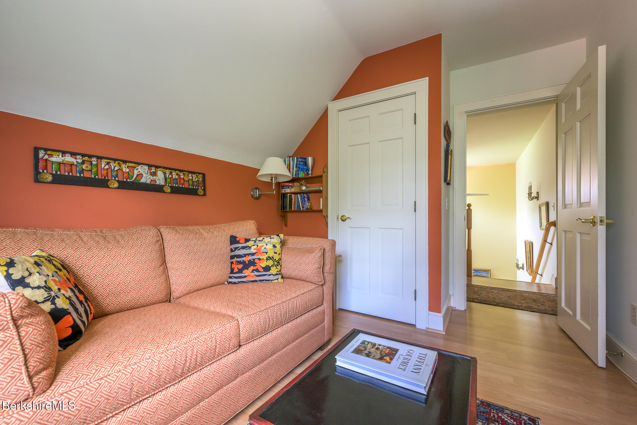 11 Prospect Hill Road, Unit F Stockbridge, MA 01262 - Photo 32 of 51 a living room with furniture and a wooden floor