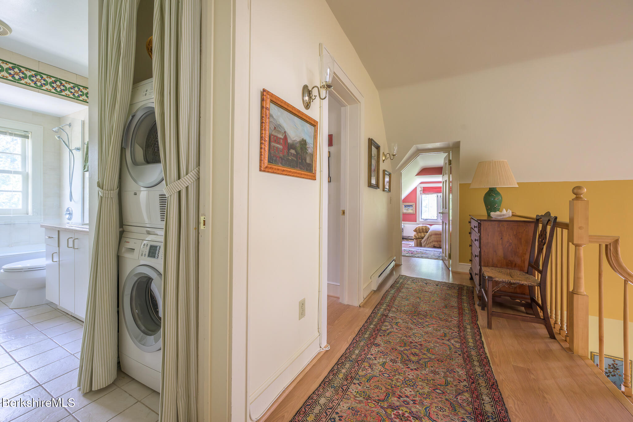 11 Prospect Hill Road, Unit F Stockbridge, MA 01262 - Photo 34 of 51 a view of a hallway with workspace and a couch