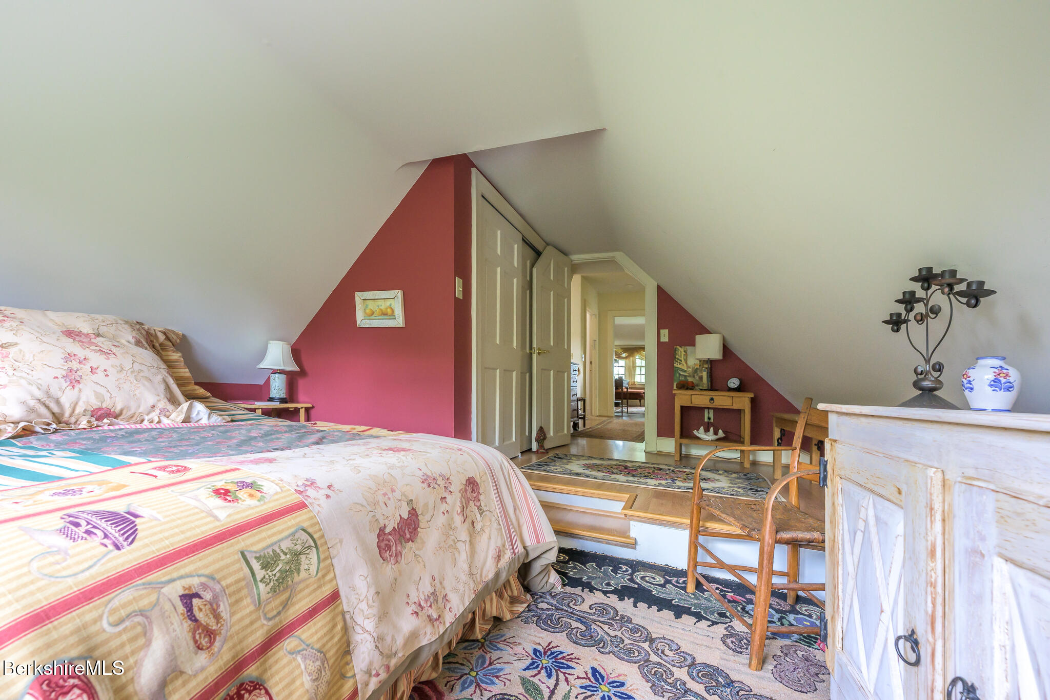 11 Prospect Hill Road, Unit F Stockbridge, MA 01262 - Photo 36 of 51 a bedroom with a bed and a potted plant