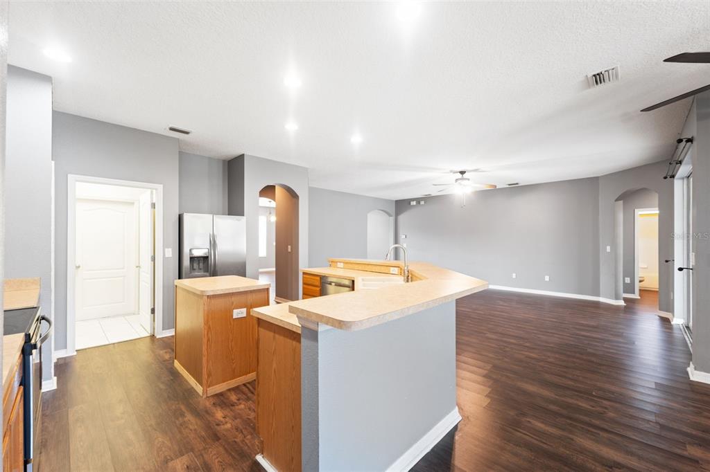 14027 Bensbrook Drive Spring Hill, FL 34609 - Photo 16 of 61 a view of a kitchen and a sink
