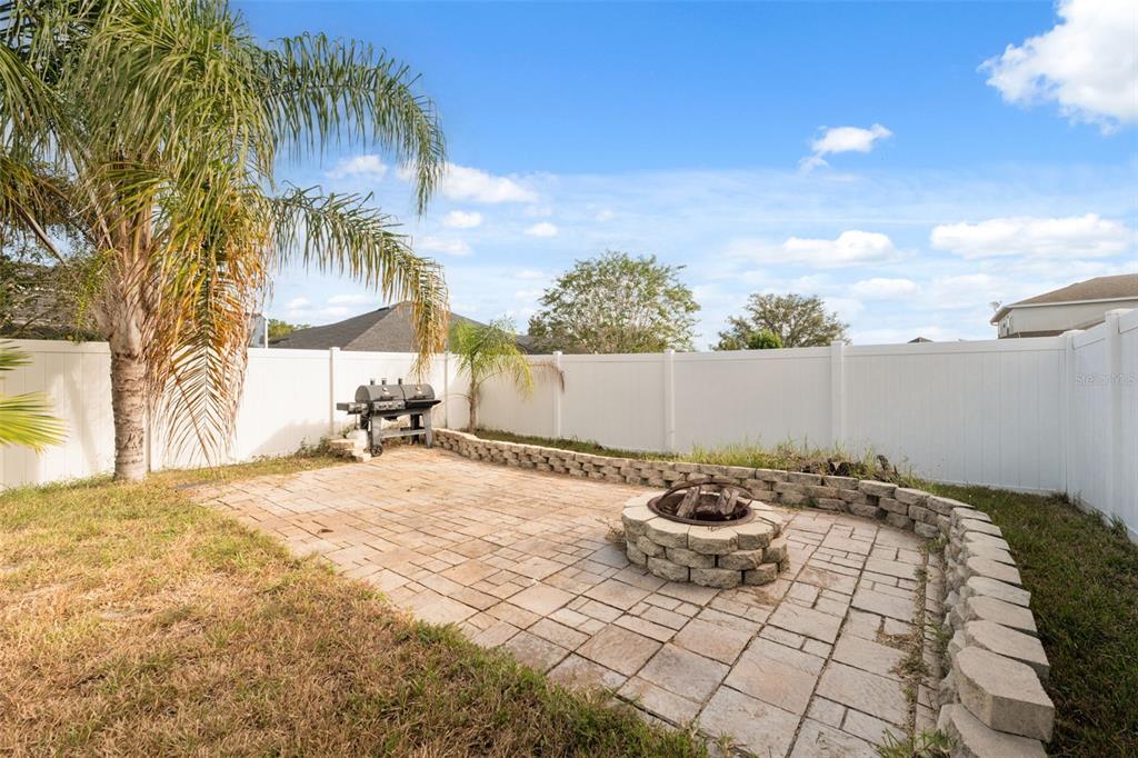 14027 Bensbrook Drive Spring Hill, FL 34609 - Photo 44 of 61 a view of a backyard of the house