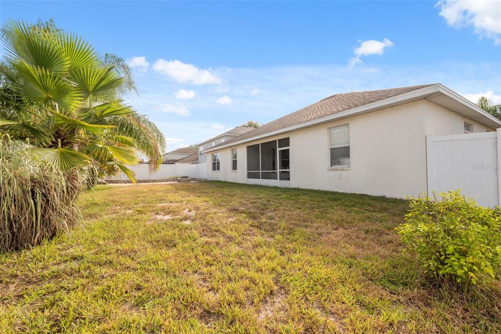 14027 Bensbrook Drive Spring Hill, FL 34609 - Photo 45 of 61 a view of a house with a yard