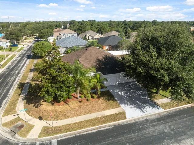an aerial view of residential building and ocean view