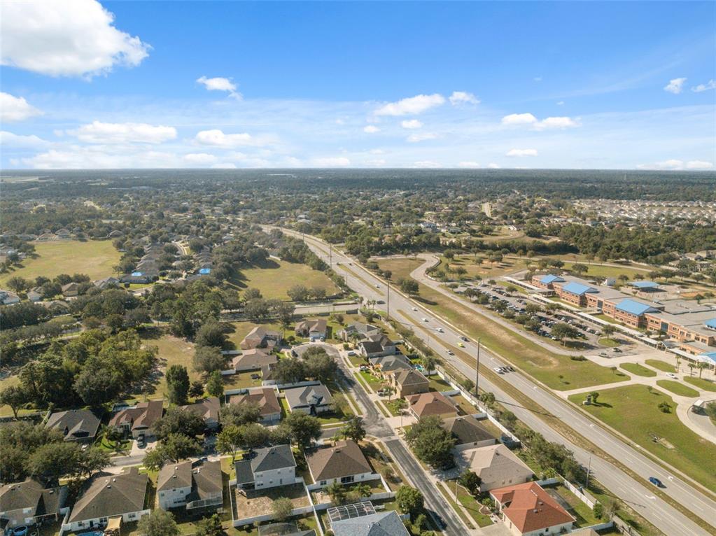 14027 Bensbrook Drive Spring Hill, FL 34609 - Photo 58 of 61 an aerial view of residential building and ocean view