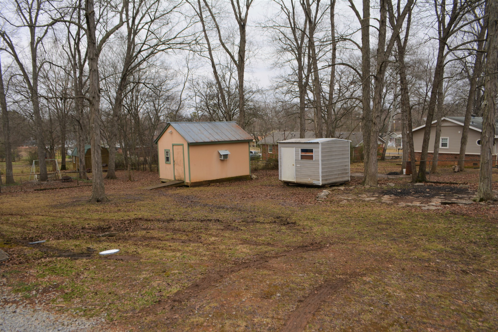 111 Chestnut Street Smyrna, TN 37167 - Photo 12 of 13 a wooden house with trees in front of it