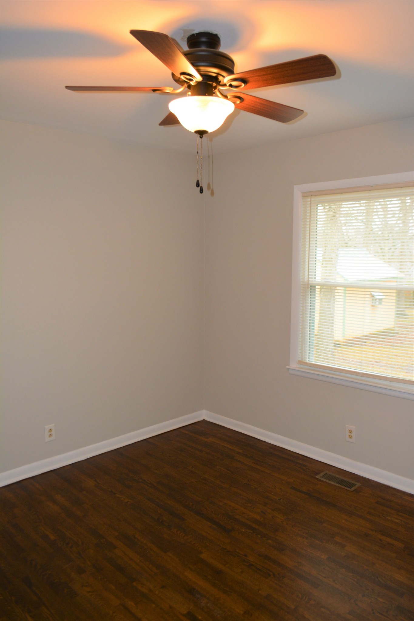 111 Chestnut Street Smyrna, TN 37167 - Photo 8 of 13 a view of a small space with wooden floor and a window