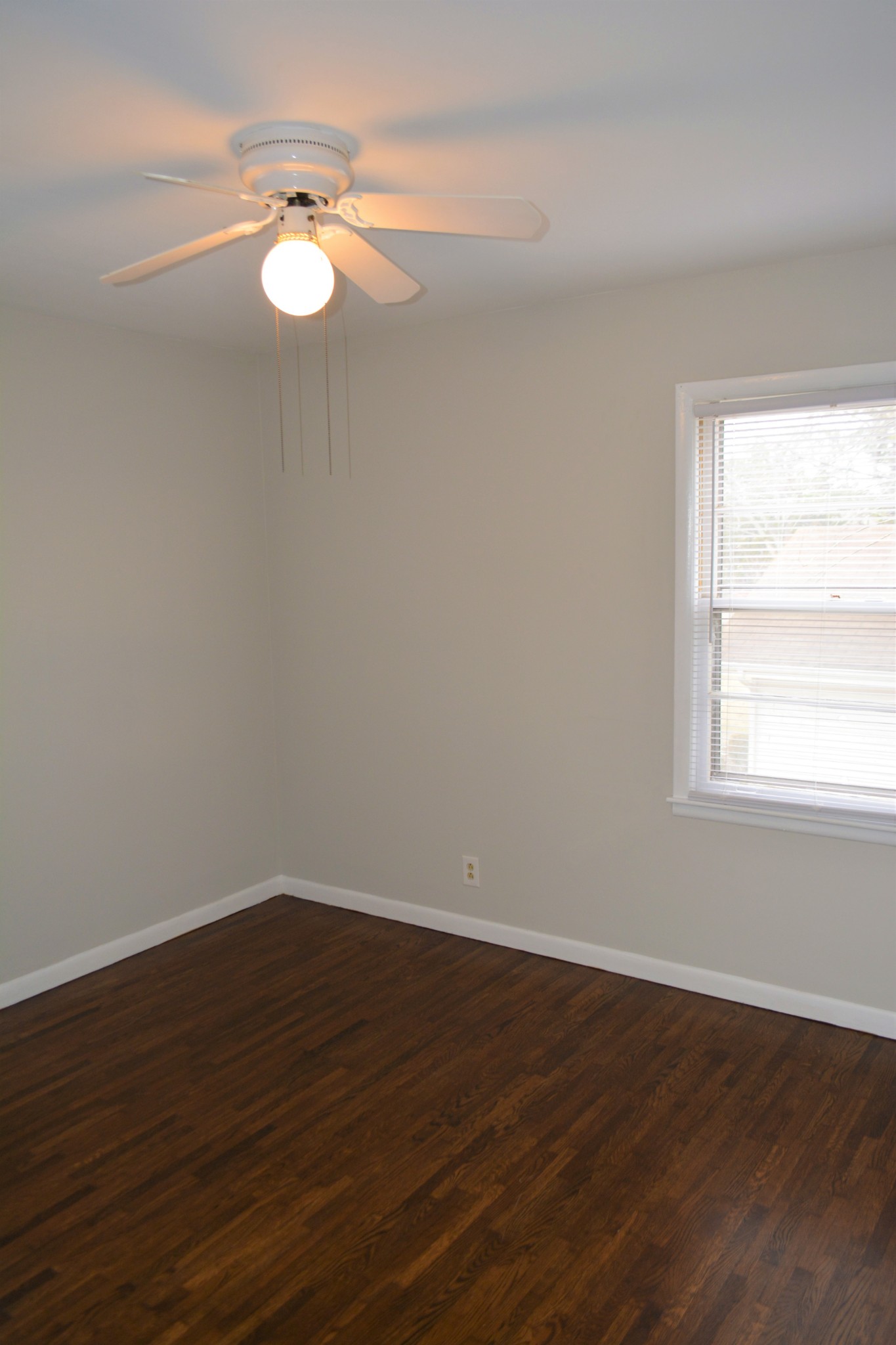 111 Chestnut Street Smyrna, TN 37167 - Photo 10 of 13 a view of a small space with wooden floor and a window
