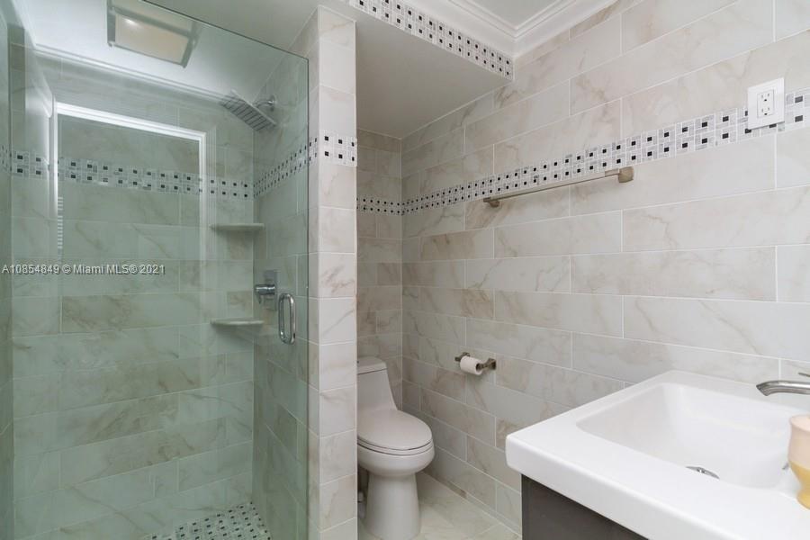 14 Royal Palm Way, Unit 5010 Boca Raton, FL 33432 - Photo 15 of 15 a bathroom with a shower and a toilet