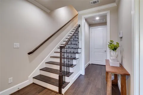 a view of entryway with wooden floor