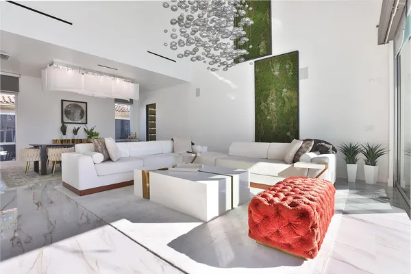 a living room with a flat screen tv and a fireplace