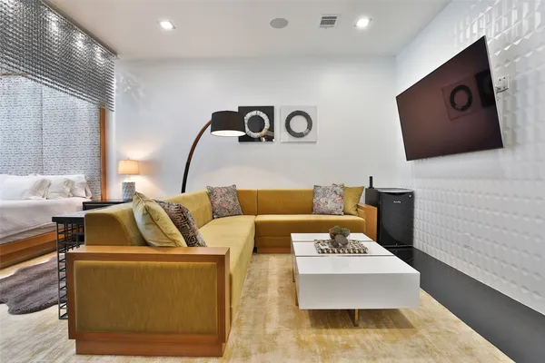 a bathroom with a bathtub shower sink and toilet