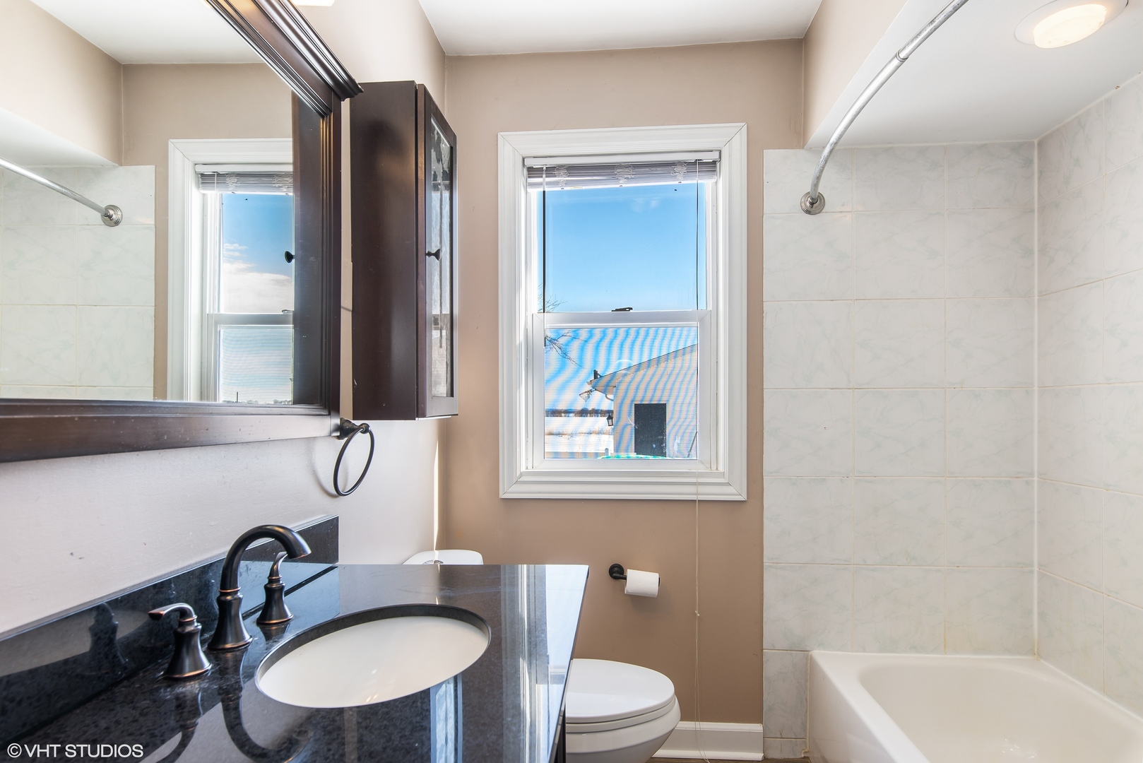 3559 Carlson Road Garden Prairie, IL 61038 - Photo 11 of 17 a bathroom with a sink a toilet and a mirror