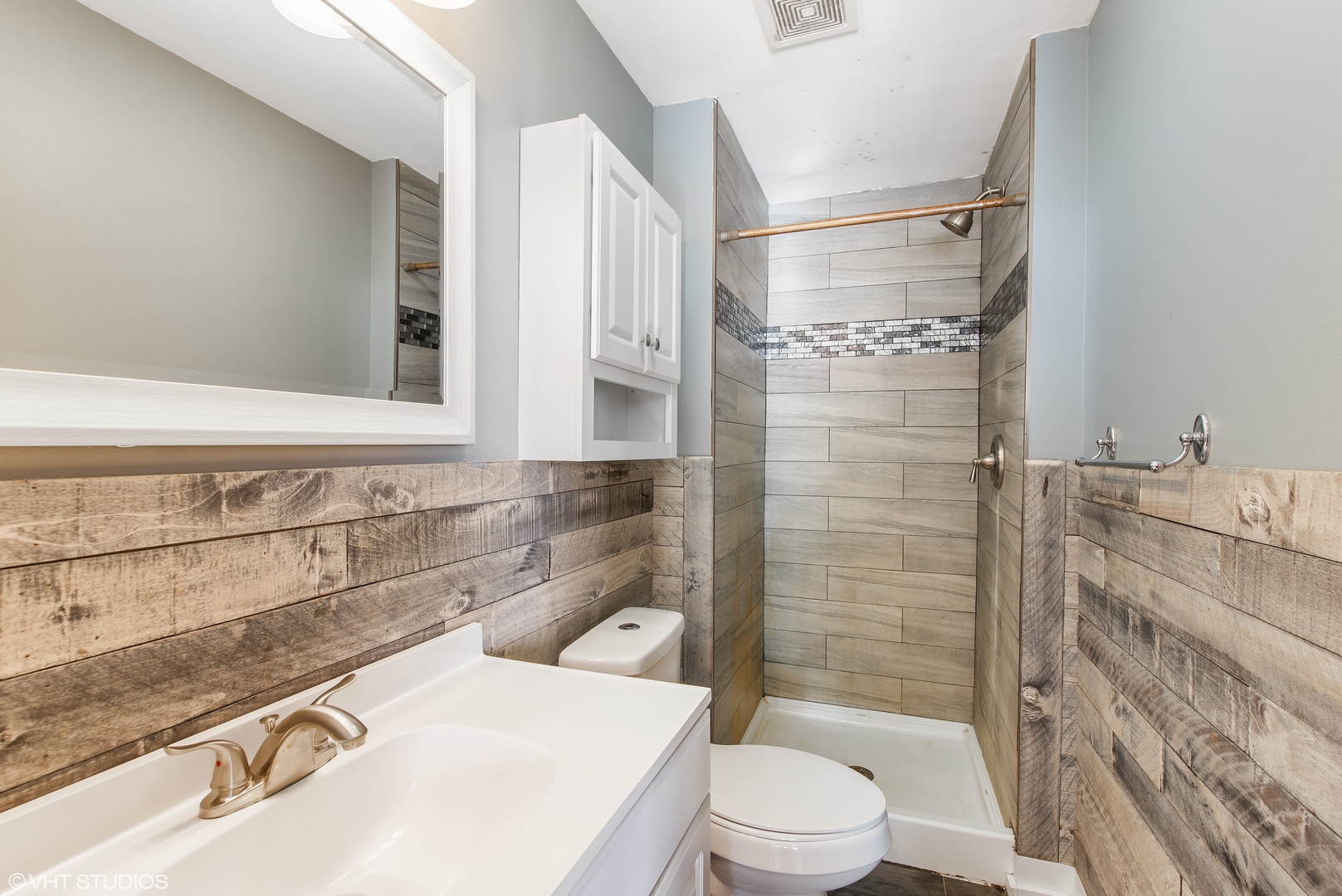 3559 Carlson Road Garden Prairie, IL 61038 - Photo 12 of 17 a bathroom with a sink toilet vanity and shower