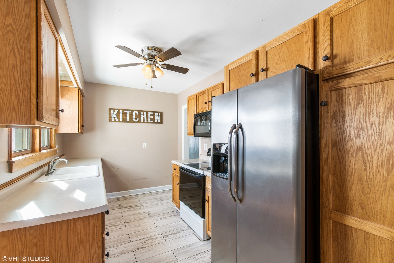 3559 Carlson Road Garden Prairie, IL 61038 - Photo 5 of 17 a kitchen with stainless steel appliances granite countertop a refrigerator and a sink