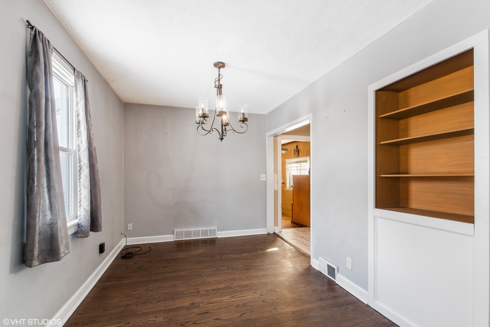 3559 Carlson Road Garden Prairie, IL 61038 - Photo 7 of 17 a view of a livingroom with a chandelier