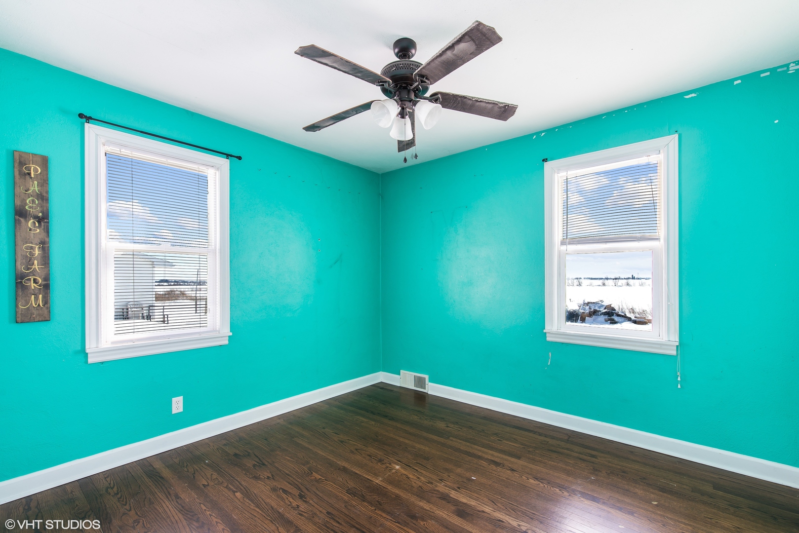3559 Carlson Road Garden Prairie, IL 61038 - Photo 9 of 17 a view of a room with window a ceiling fan and wooden floor
