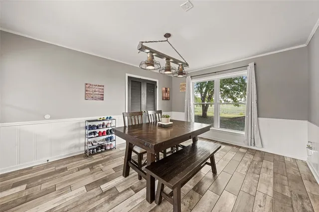a view of a dining room with furniture