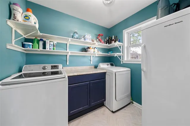 a bedroom with bed and window