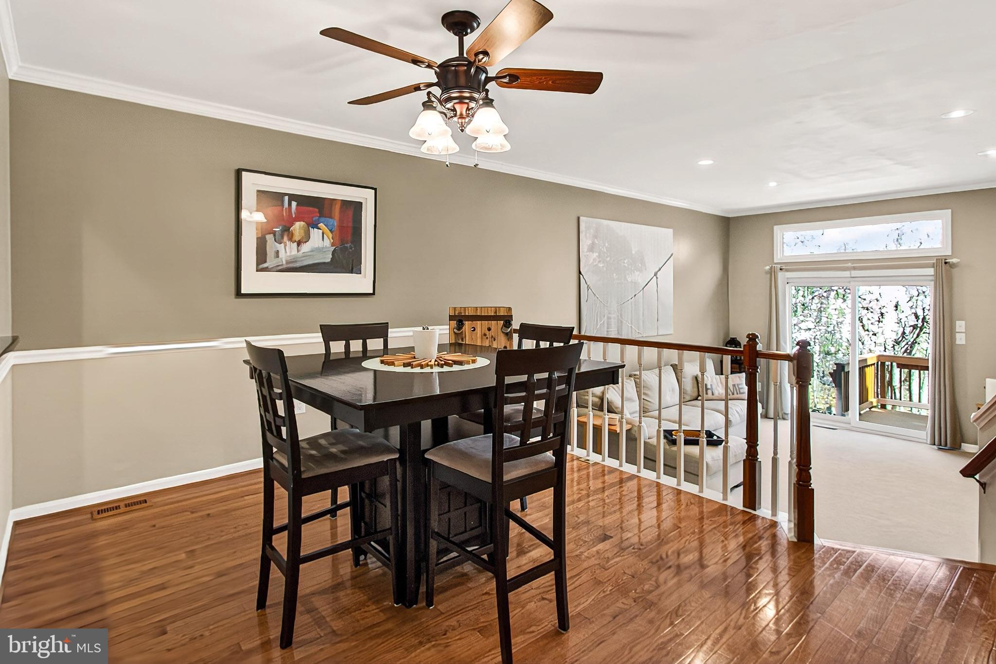 7923 Valleyfield Drive Springfield, VA 22153 - Photo 15 of 51 a view of a a dining room with furniture window and wooden floor