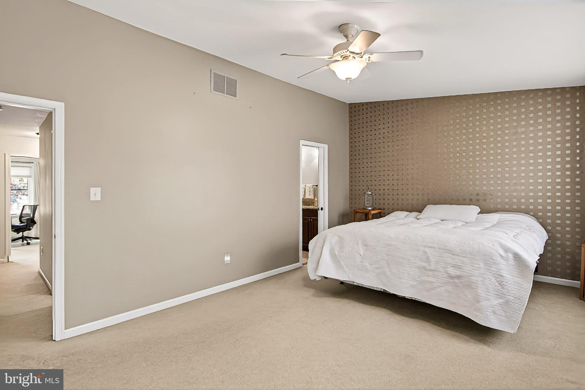 7923 Valleyfield Drive Springfield, VA 22153 - Photo 30 of 51 a bedroom with a bed and a ceiling fan