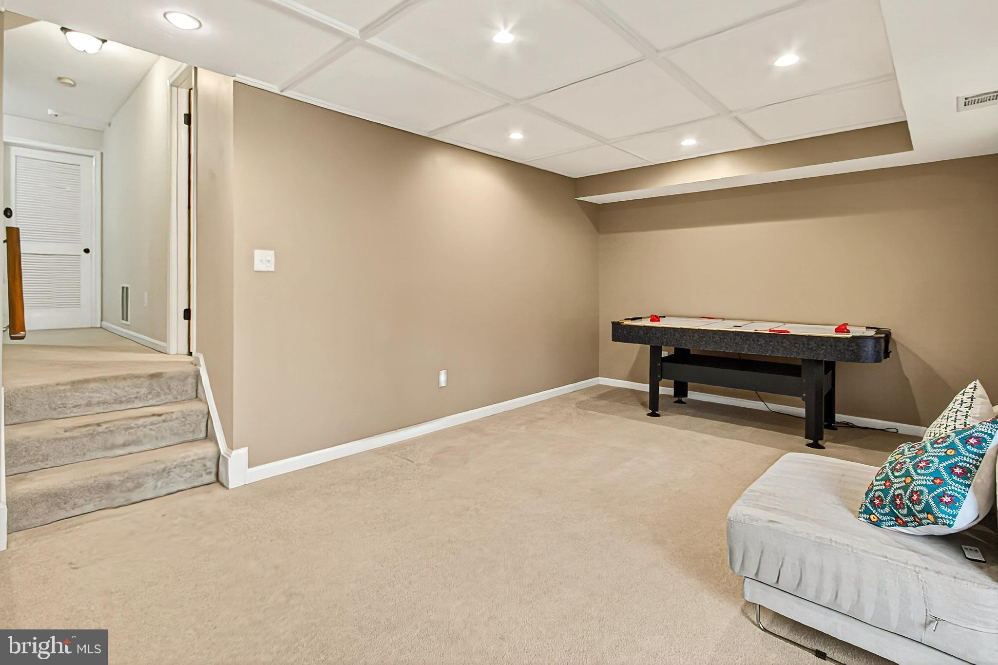 7923 Valleyfield Drive Springfield, VA 22153 - Photo 41 of 51 a living room with a couch and a piano table