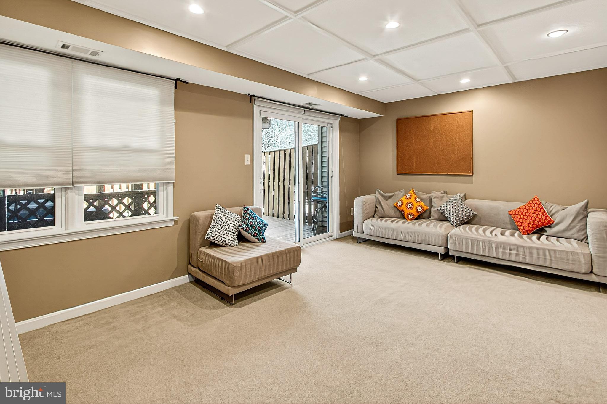 7923 Valleyfield Drive Springfield, VA 22153 - Photo 43 of 51 a living room with furniture toys and a window