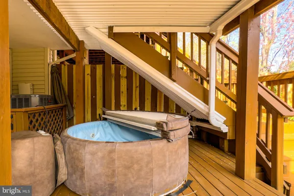 a view of outdoor space with wooden fence