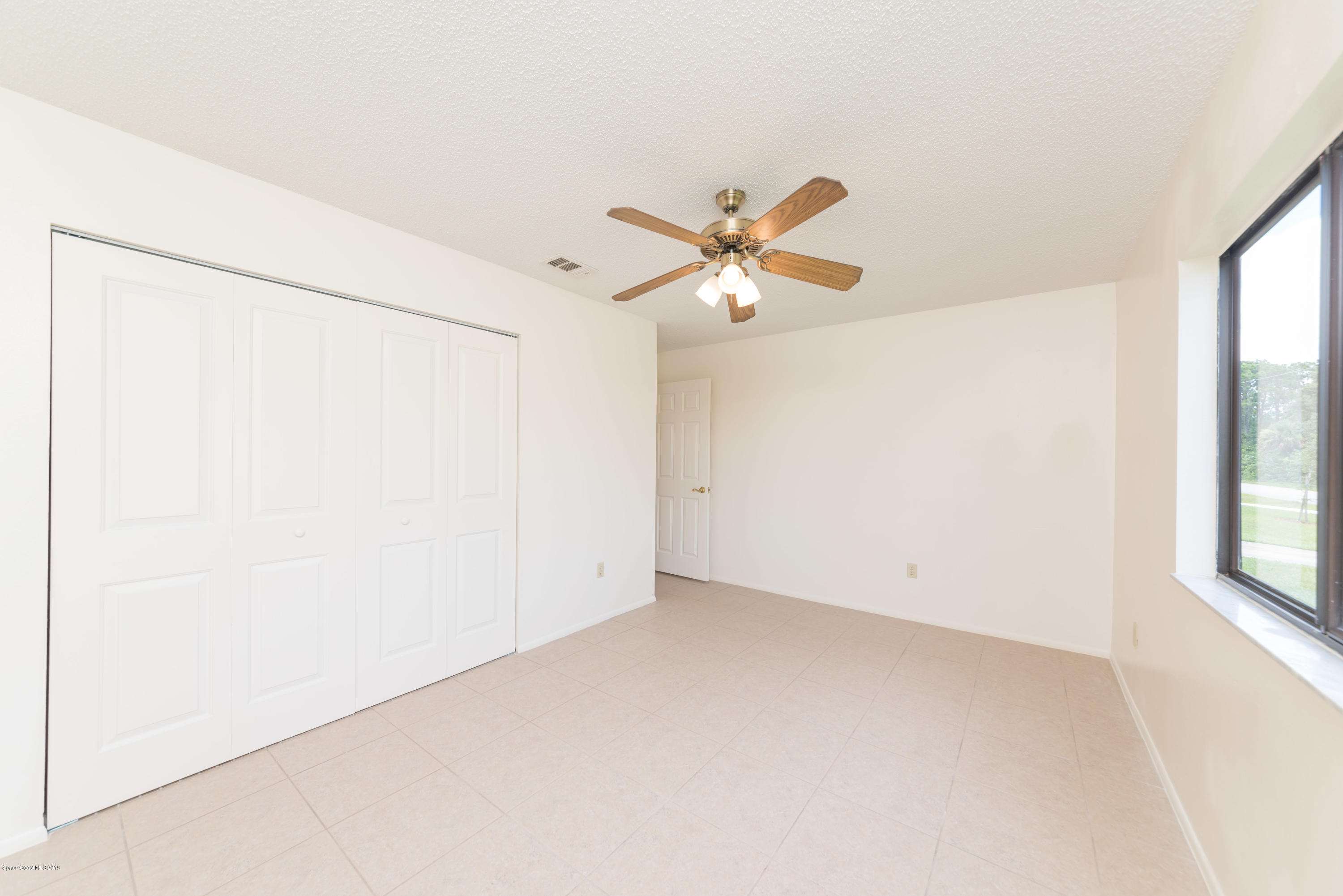 1272 Wabash Road Southeast Palm Bay, FL 32909 - Photo 12 of 18 13 Bedroom 3 View 3