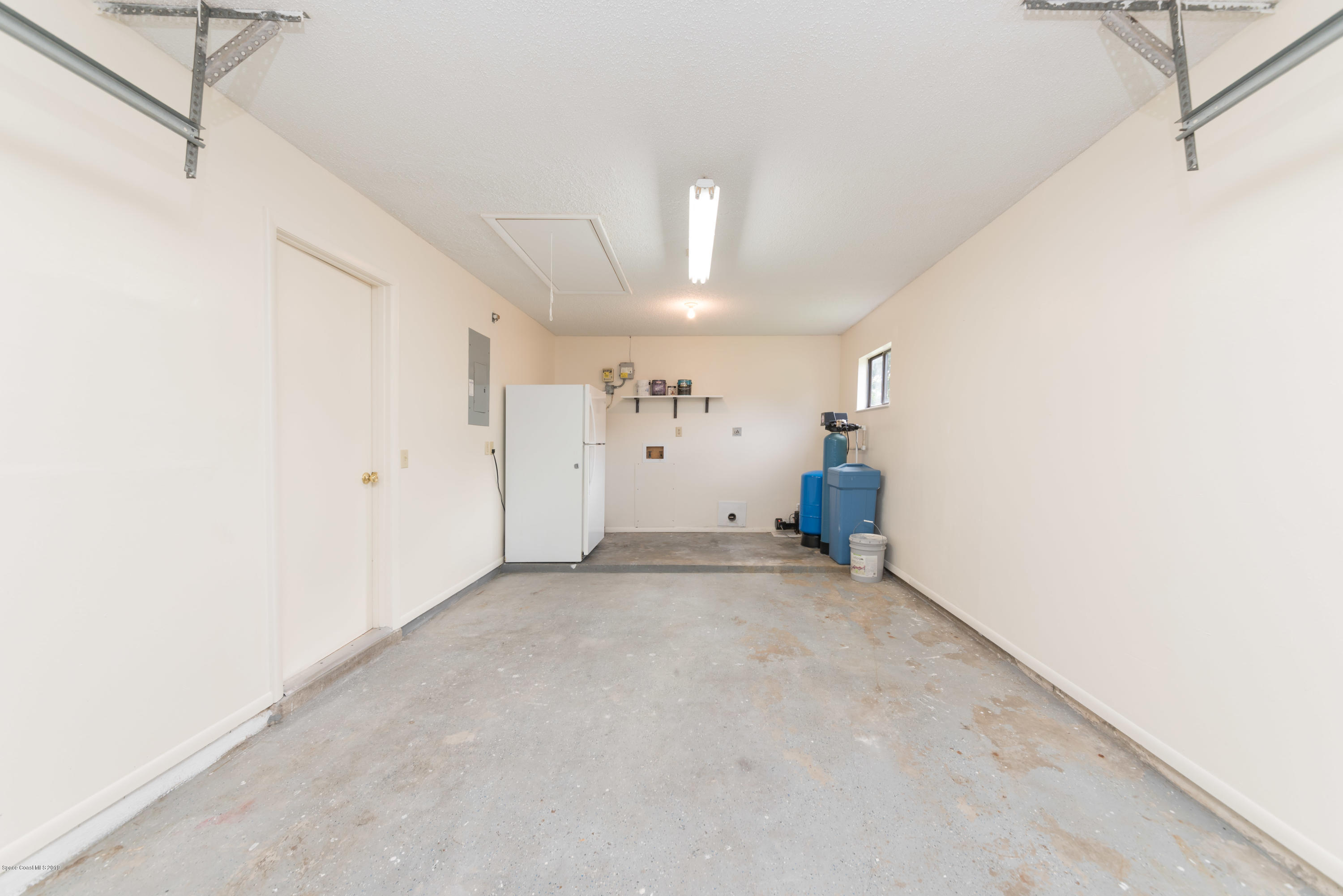 1272 Wabash Road Southeast Palm Bay, FL 32909 - Photo 14 of 18 15 Single Car Garage and Laundry