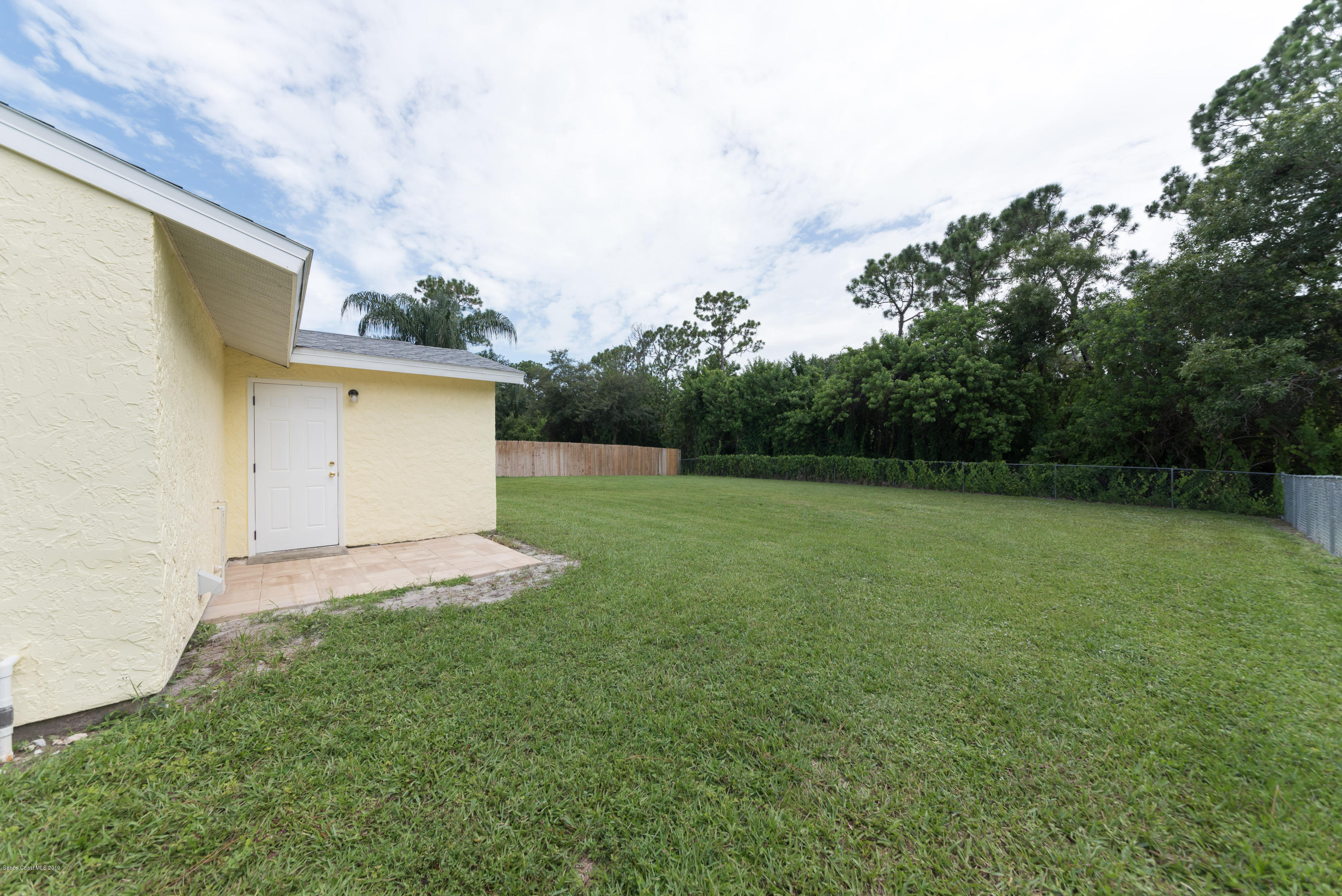 1272 Wabash Road Southeast Palm Bay, FL 32909 - Photo 18 of 18 19 Back Yard View 3