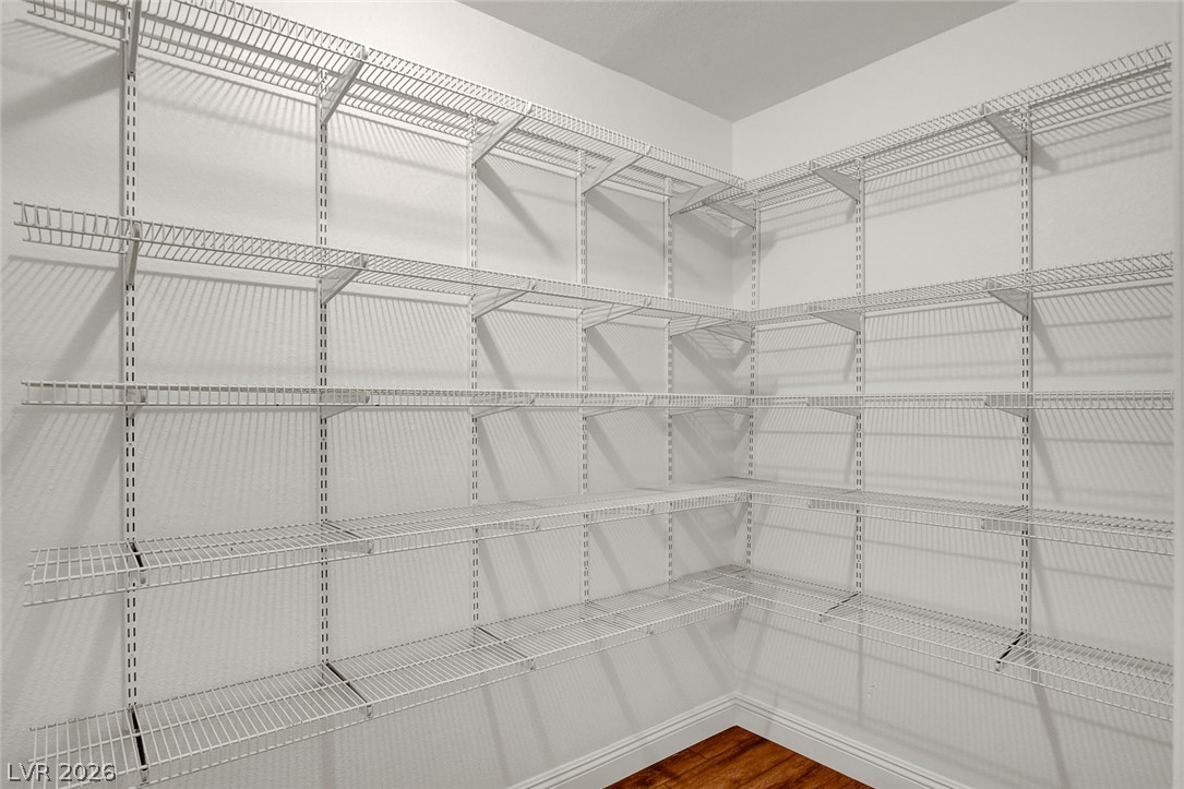 1810 Pinto Road Henderson, NV 89002 - Photo 29 of 53 Ample wire shelving maximizes storage in this well-organized walk-in closet.