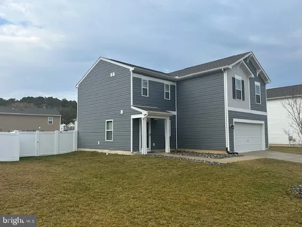 a front view of house with yard