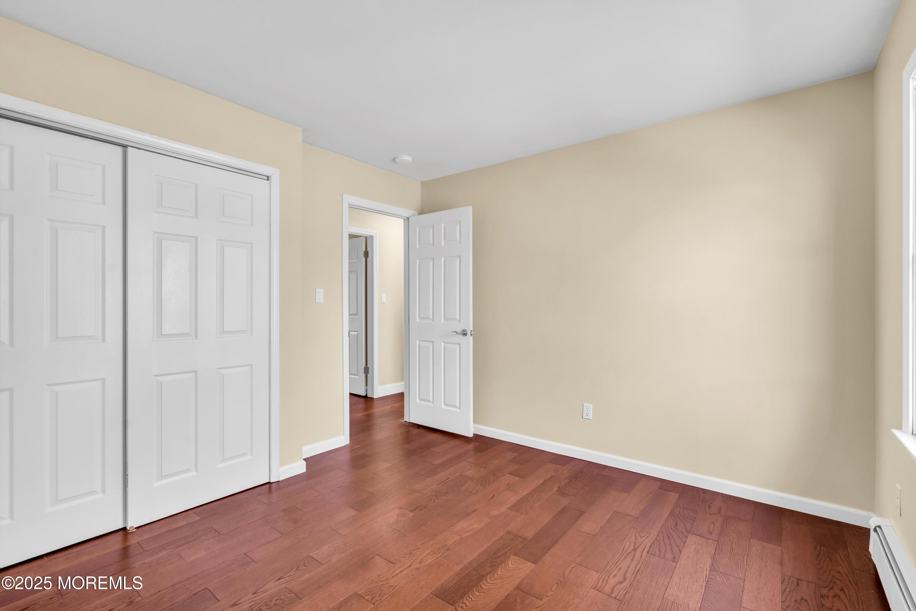 1612 Beverly Road Forked River, NJ 08731 - Photo 19 of 38 a view of an empty room and wooden floor