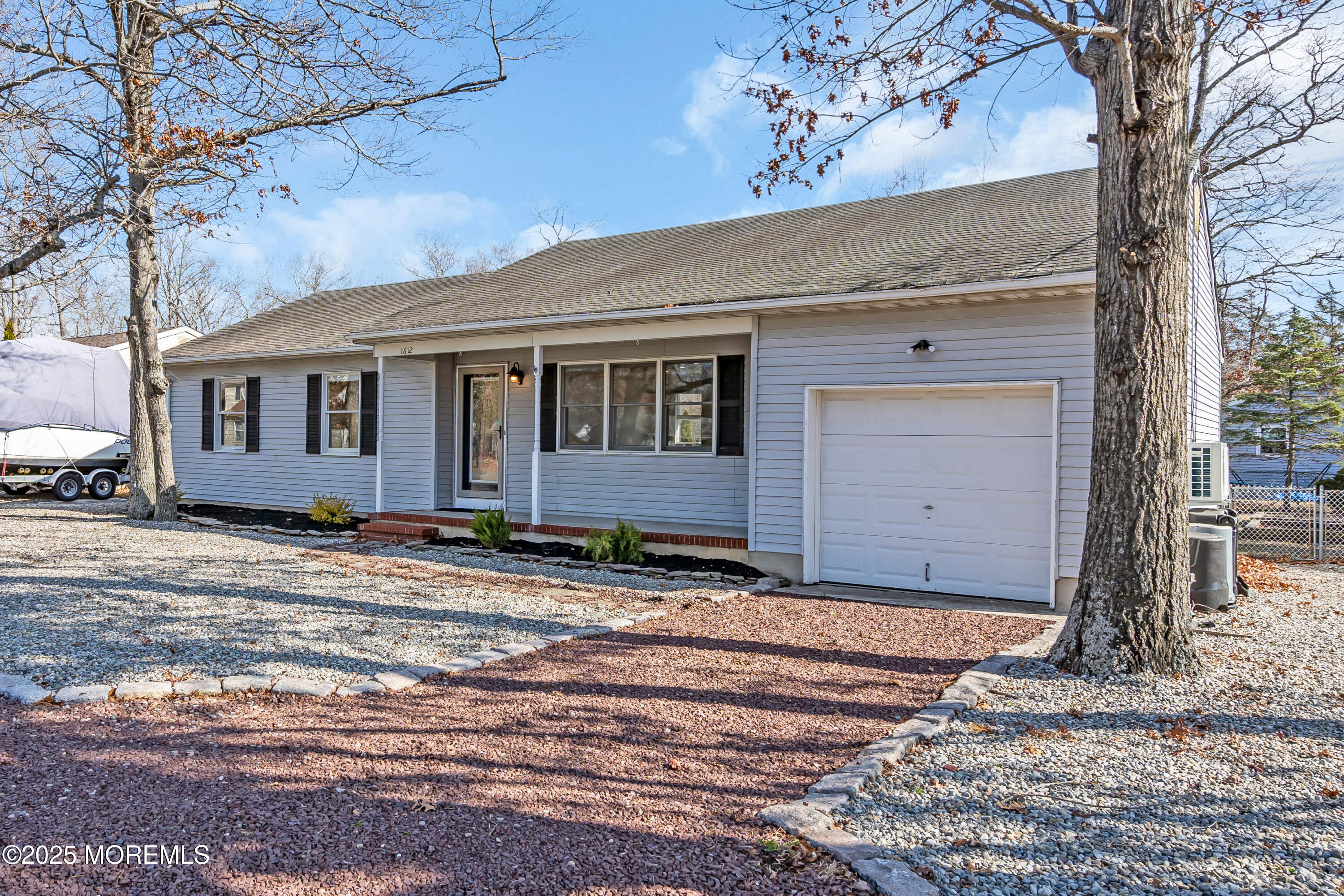 1612 Beverly Road Forked River, NJ 08731 - Photo 33 of 38 a view of a house with a yard