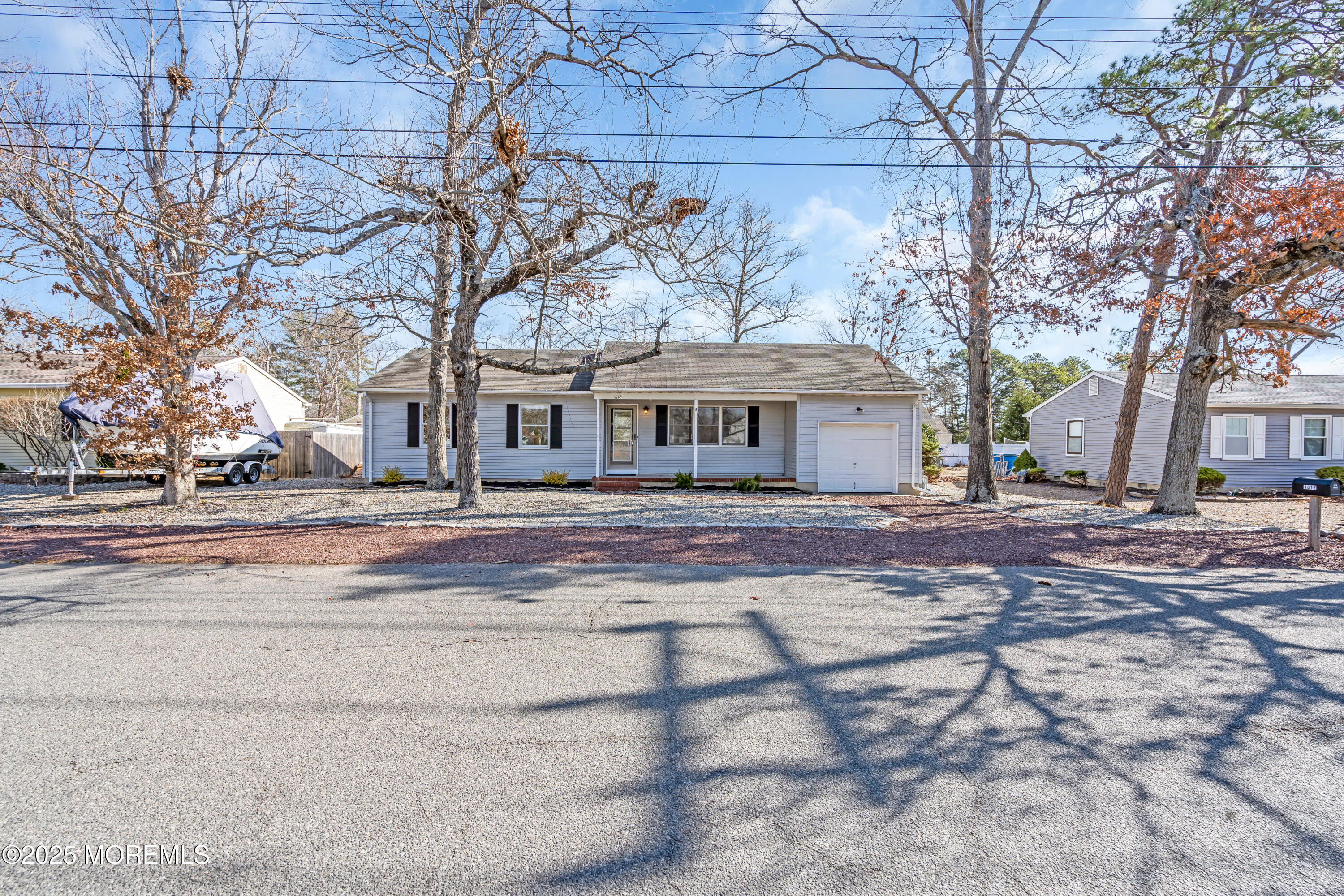 1612 Beverly Road Forked River, NJ 08731 - Photo 35 of 38 a front view of a house with a yard