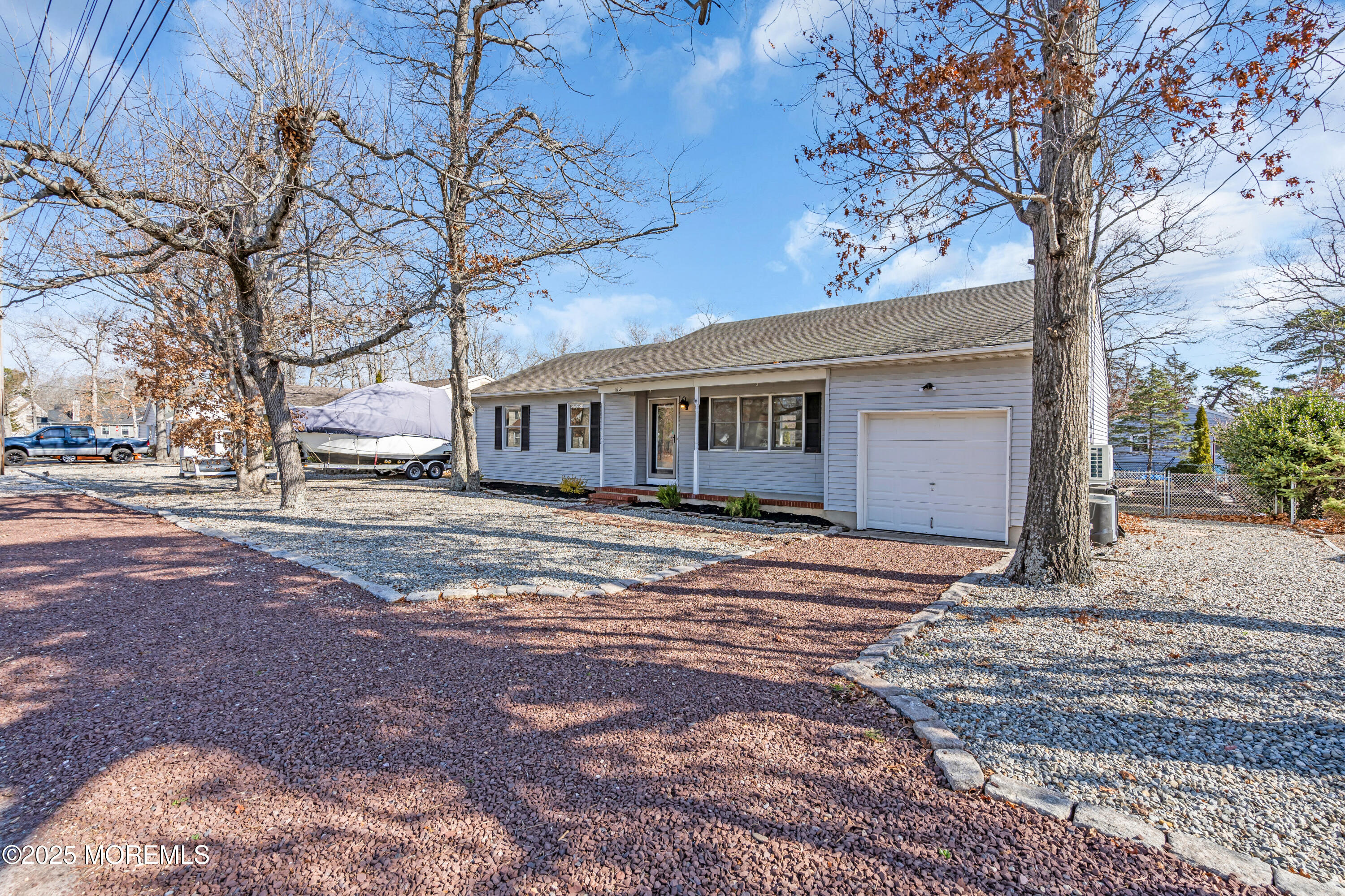 1612 Beverly Road Forked River, NJ 08731 - Photo 36 of 38 a view of a house with a yard