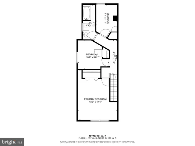 a picture of a bench in front of a wall