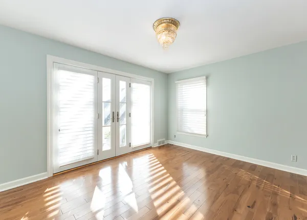 a view of an empty room with a window