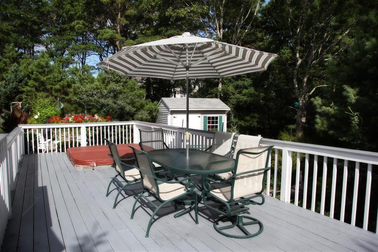 87 Cairn Ridge Road East Falmouth, MA 02536 - Photo 25 of 34 a view of a chairs and table in the roof deck