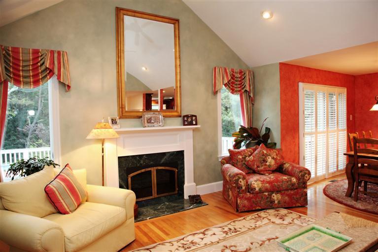 87 Cairn Ridge Road East Falmouth, MA 02536 - Photo 4 of 34 a living room with furniture and a fireplace