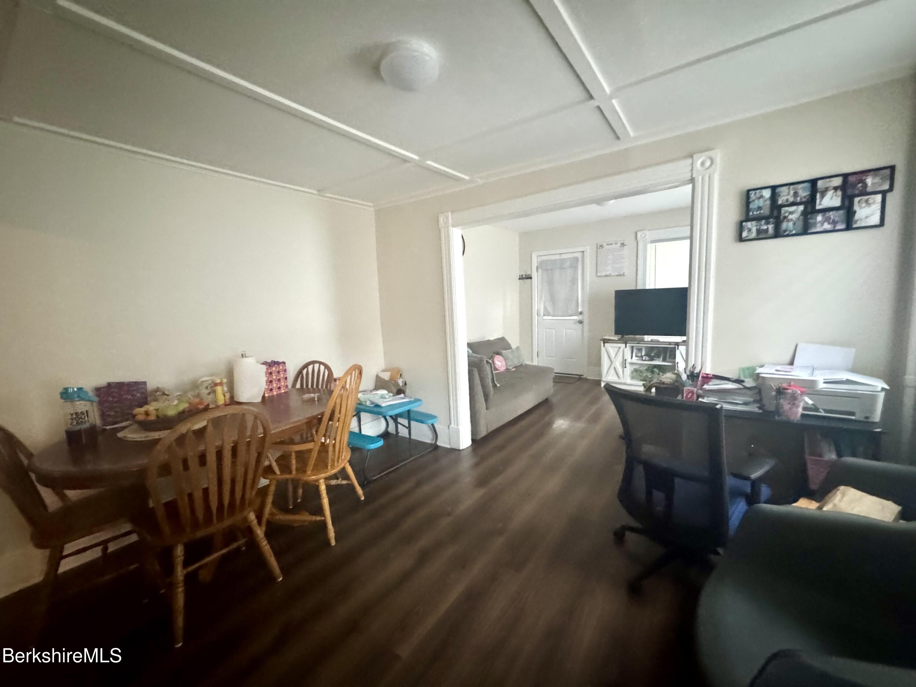50-52 John Street Pittsfield, MA 01201 - Photo 18 of 25 a view of a dining room with furniture