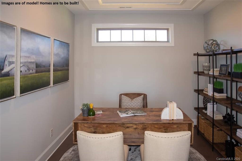 2069 New Style Way, Unit 32 Tega Cay, SC 29708 - Photo 22 of 30 a room with a table chairs and entryway