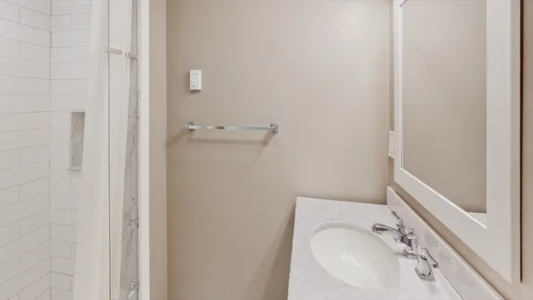 a bathroom with a sink and toilet