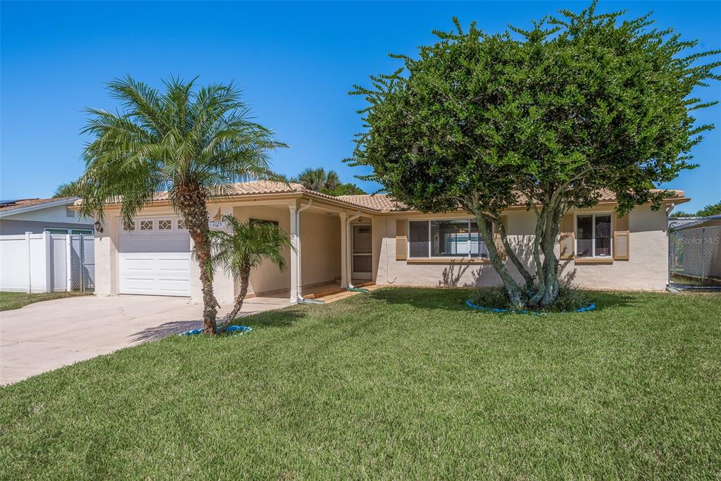 4625 Compass Court New Port Richey, FL 34652 - Photo 1 of 1 a front view of house with yard and green space