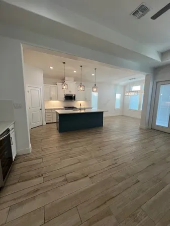 a view of kitchen and sink
